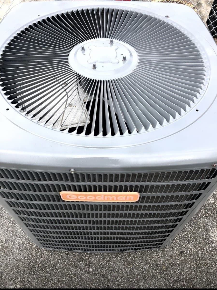 Air conditioner compressor in outdoor condenser unit