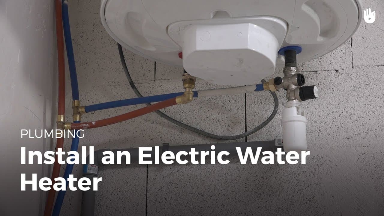 Electric water heater mounted on a bathroom wall
